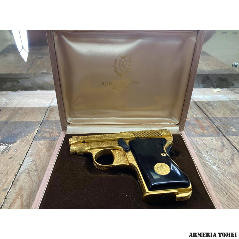 BERETTA 1915 placcata oro e intarsiata a mano
