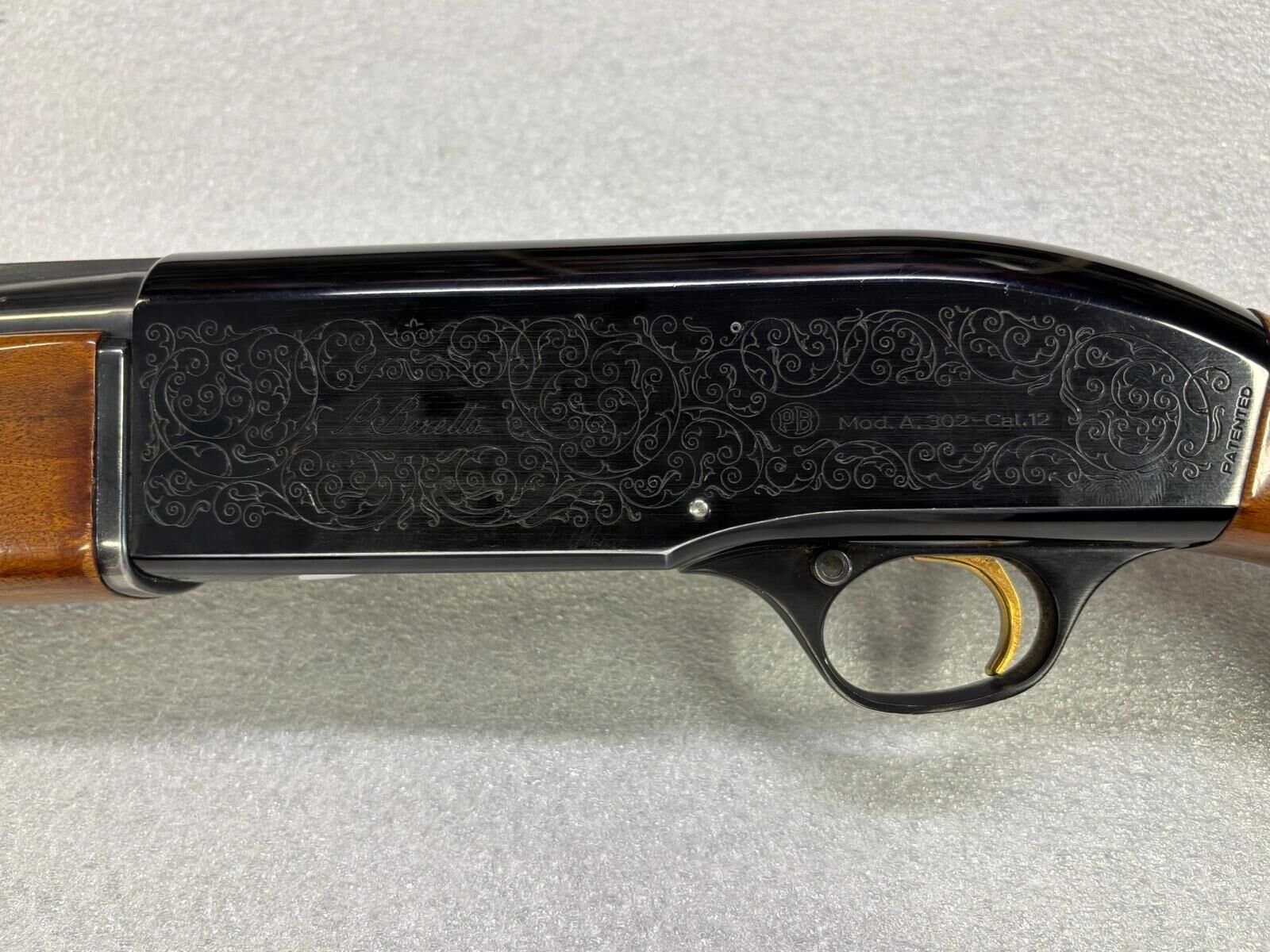 BERETTA MOD. 302 CAL. 12 CM 71 **